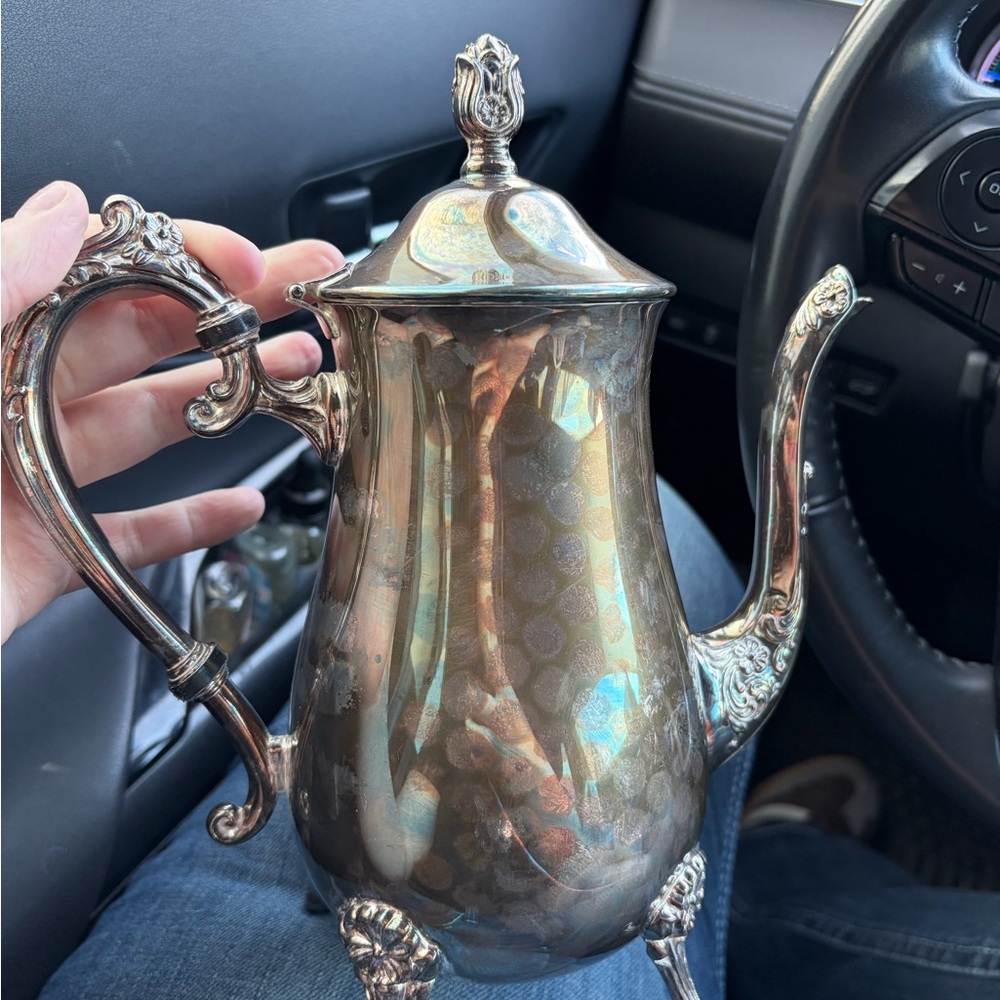 Elegance Silver Teapot with Ornate Handle